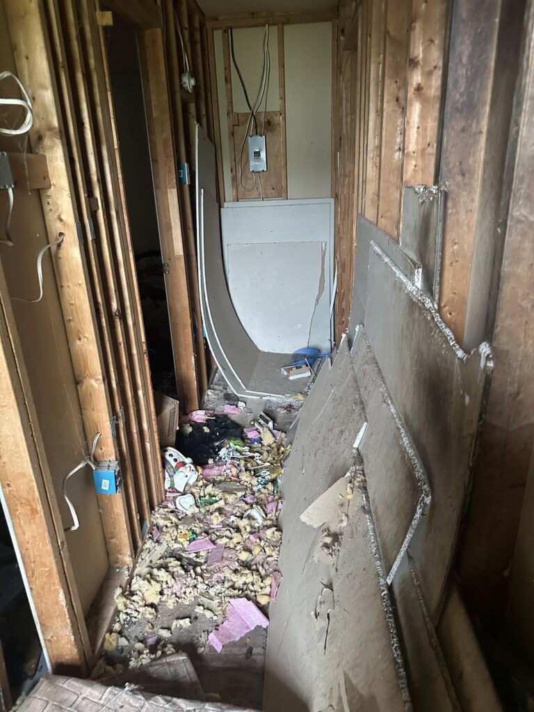 Mechanical systems at 408 & 410 3rd Avenue, Beaver Falls PA — furnace, water heater, electrical panel, plumbing and heating.