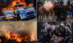 “Burning car in Los Angeles street during protest, with silhouetted figures and smoke rising into the evening sky.”