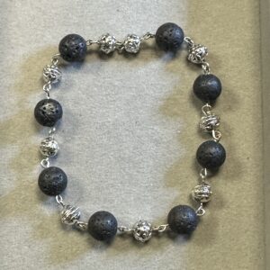 Handmade black lava stone wire bracelet with Tibetan silver bead and silver lobster clasp