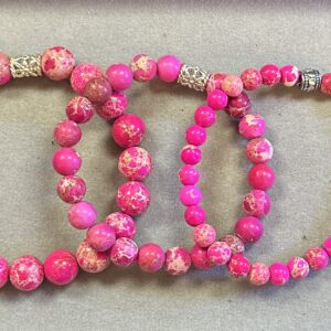 Handmade hot pink sea sediment jasper triple stack bracelet set with vibrant marbled gemstone beads