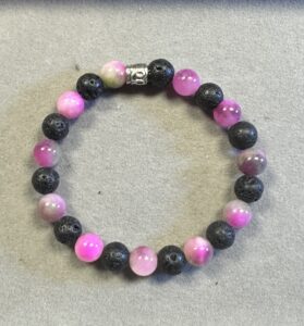Handmade pink Persian jade and black lava stone bracelet with natural polished gemstone beads