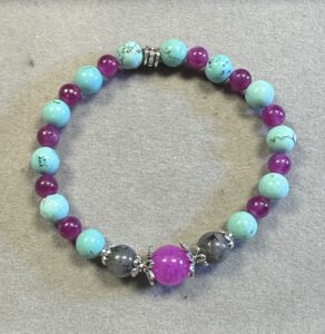 Handmade howlite, black labradorite, and pink tourmaline bracelet with natural polished gemstone beads